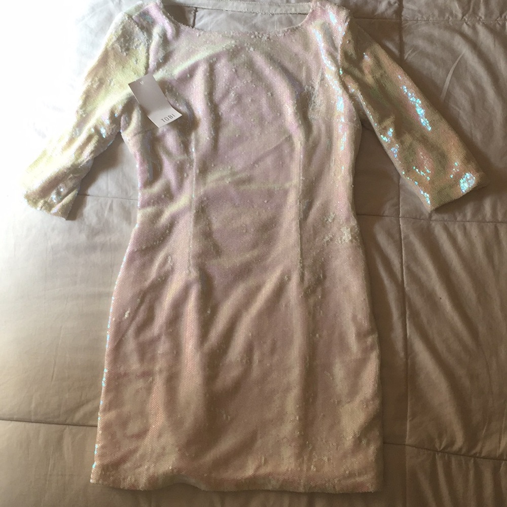 Iridescent white sequined dress